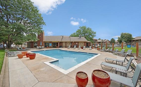 Skyline open, resort style pool with ample seating surrounding the area.