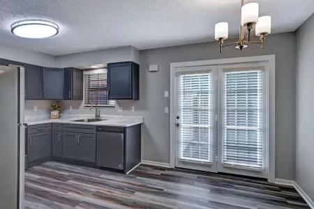 Kitchen nook located within the kitchen for residents to place a table in.