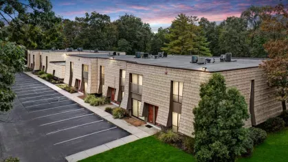 another dusk view of the buildings, emphasizing their unique architecture and serene surroundings.