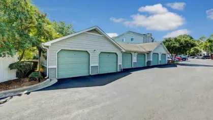 A row of private garages provides residents with secure and convenient parking solutions.