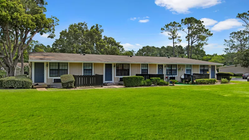 A community of connected homes surrounded by greenery and open space.