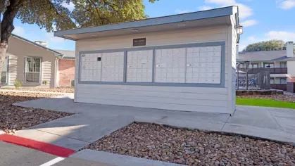 A well-maintained mail center at The Maxwell Apartments, providing residents with convenient access to secure mailboxes.
