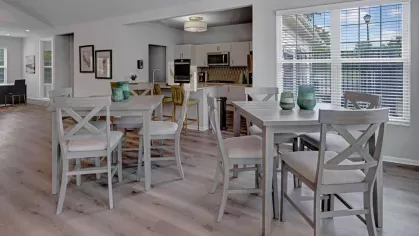 A spacious and beautifully decorated apartment interior featuring elegant furnishings, cozy bedrooms, and modern kitchens.