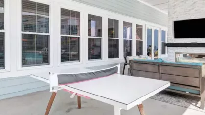 Outdoor patio with a ping-pong table