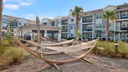 Outdoor are with hammocks and well maintained greenery