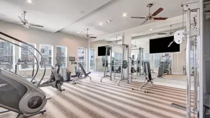 Premium gym with top-tier fitness machines, sleek modern design, and a motivating atmosphere.