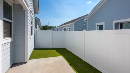 Private yard with well maintaned lawn.