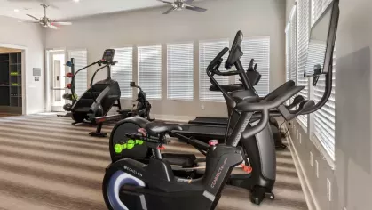 Premium gym with top-tier fitness machines, sleek modern design, and a motivating atmosphere.