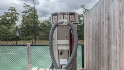 Convenient on-site car care center at The Landings of Conroe, featuring a vacuum station and practical amenities for residents.