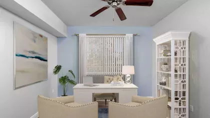 Stylish and inviting home office with a modern white desk, cozy beige chairs, and elegant decor. Natural light streams in through large windows, creating an inspiring workspace.