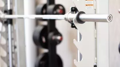 A dedicated space for strength and resistance training with weight racks, stability balls, and resistance bands, ensuring a well-rounded fitness experience.