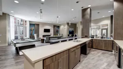 Modern kitchen and bar area in the lounge, designed for entertaining and relaxation.