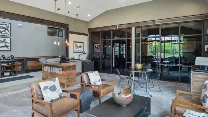 Inviting seating area in the Riverworks lobby with modern furniture and natural light.