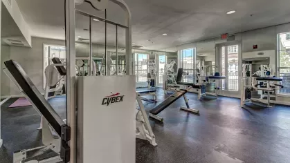 State-of-the-art Cybex strength machines in The Saulet’s luxury apartment fitness center.