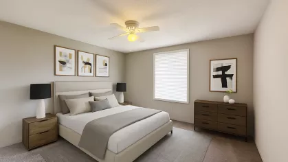 Virtually staged primary bedroom featuring a plush bed with neutral linens, two nightstands, contemporary artwork, and soft carpeted flooring.
