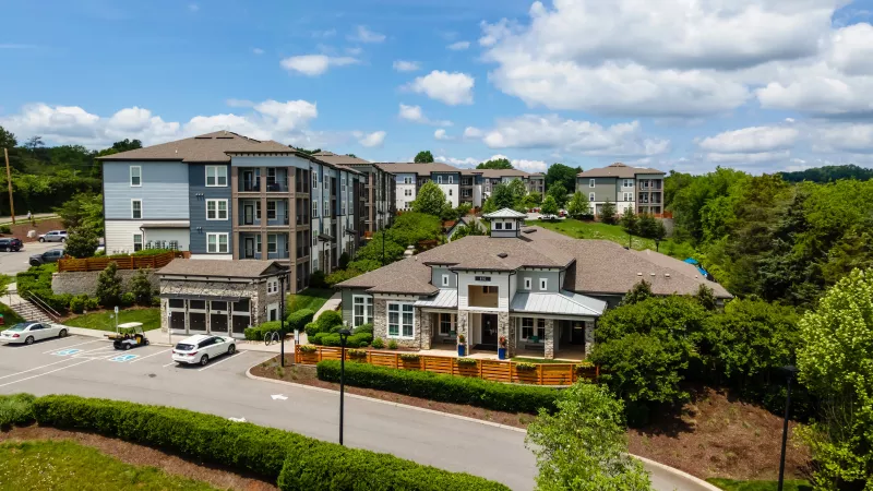 Aerial view of Avery at Turkey Creek showcasing clubhouse, leasing office, and surrounding apartments.