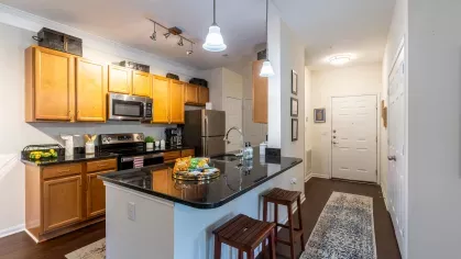 Bright, open kitchen with ample amounts of storage. and upgraded, stainless steel appliances.