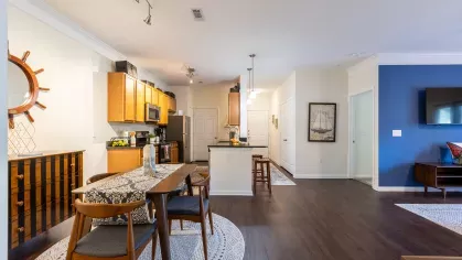 Open kitchen concept with easy viewing of the living room and a space for a kitchen table to enjoy.