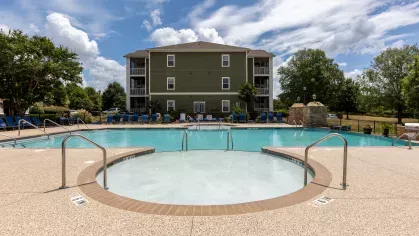 Hot tub connected to the resort style swimming pool. 