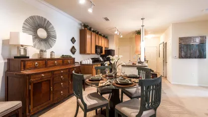 Open kitchen concept with easy viewing of the living room and a space for a kitchen table to enjoy.