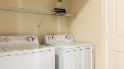 Washer and dryer located in laundry room.