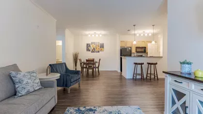 Open concept with view of the kitchen and kitchen nook from the living room.