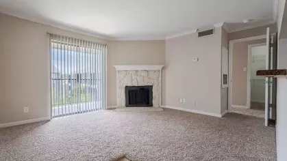 Large, open living room with inviting atmosphere.