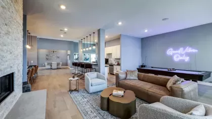 Resident clubhouse with kitchen and game section.