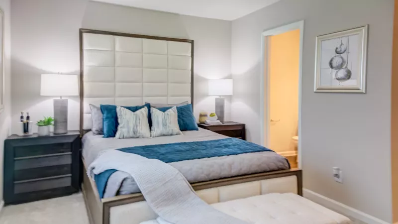 Large primary bedroom with adjacent bathroom.