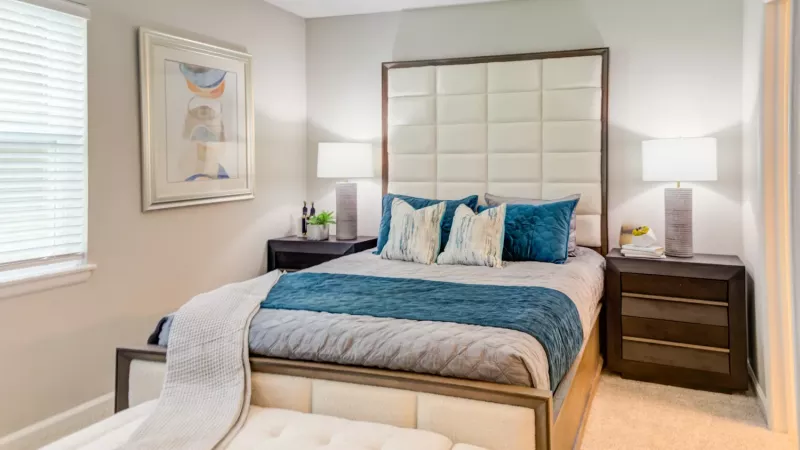 Large primary bedroom with adjacent bathroom.