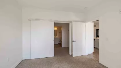 Open bedroom off of the living room.