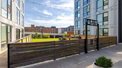 Enclosed dog park for residents to enjoy with their dogs at Industry Columbus.. 