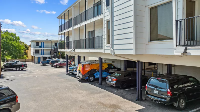 Covered parking with easy access to apartments for residents.