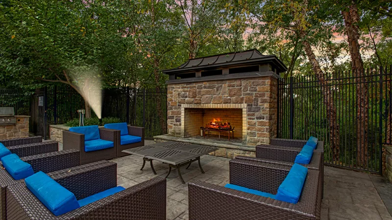 Outdoor fireplace with seating.