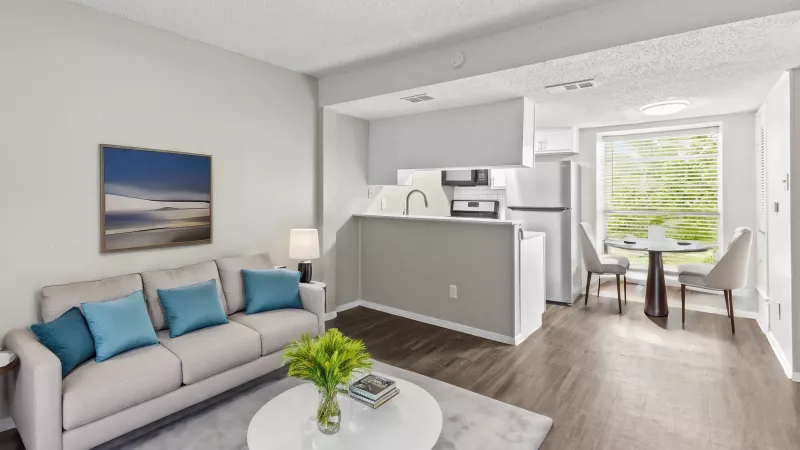 Bright, open kitchen and living room for residents to enjoy.