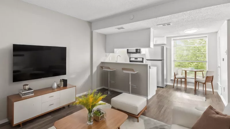 Bright, open kitchen and living room for residents to enjoy.