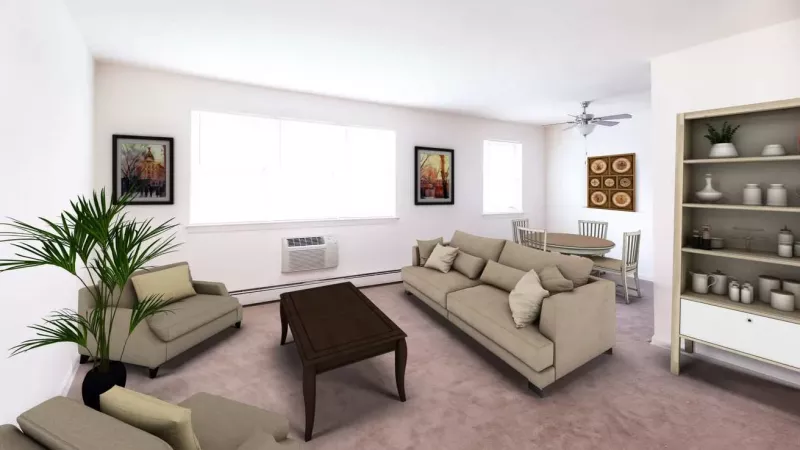 A living room with plush carpeting, large windows, and a ceiling fan, providing a relaxing and comfortable space.