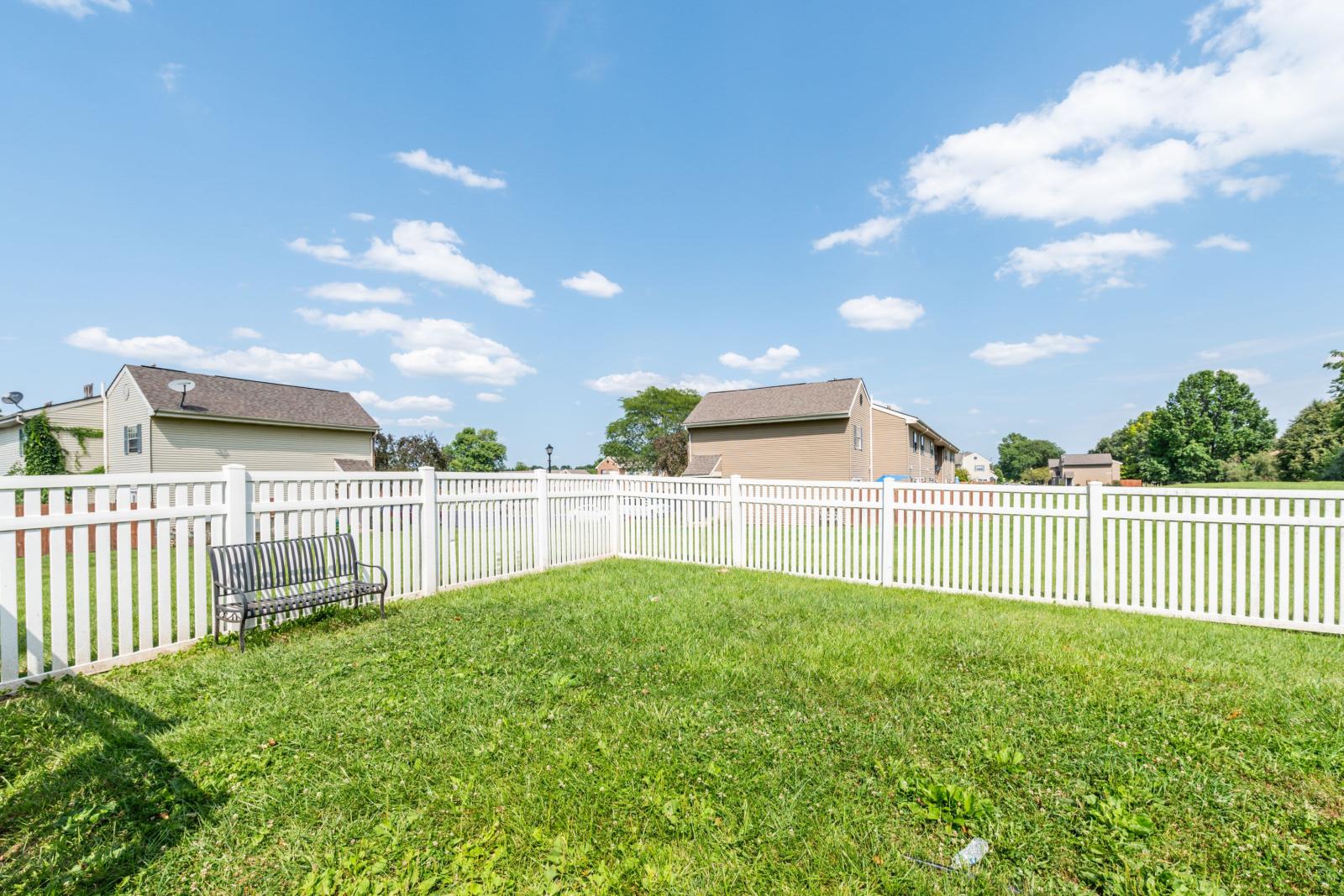 "Picnic pavilion at Worthington Meadows Apartments with covered seating and open views of the surrounding community."