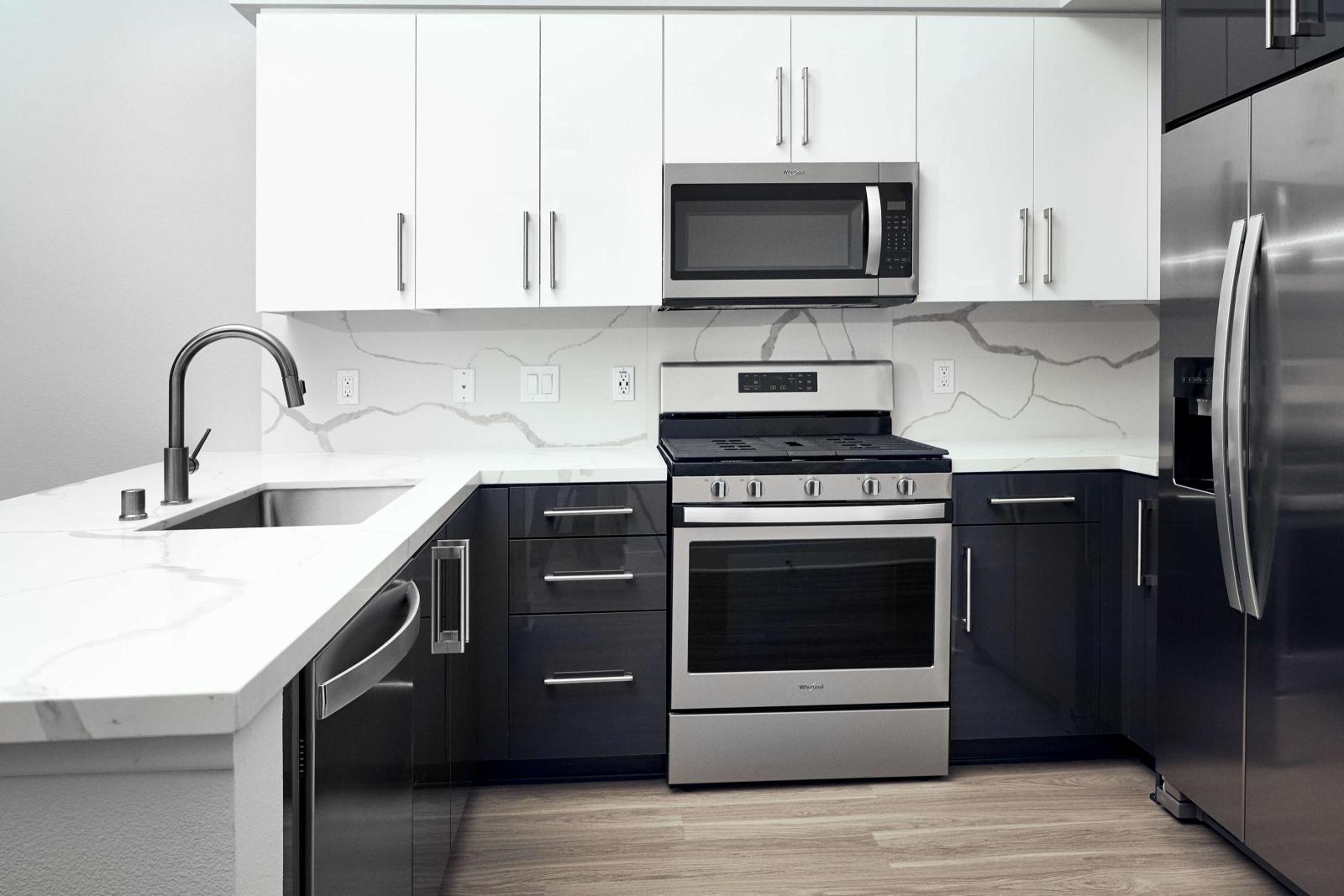 Modern kitchen with stainless steel appliances and sleek cabinetry