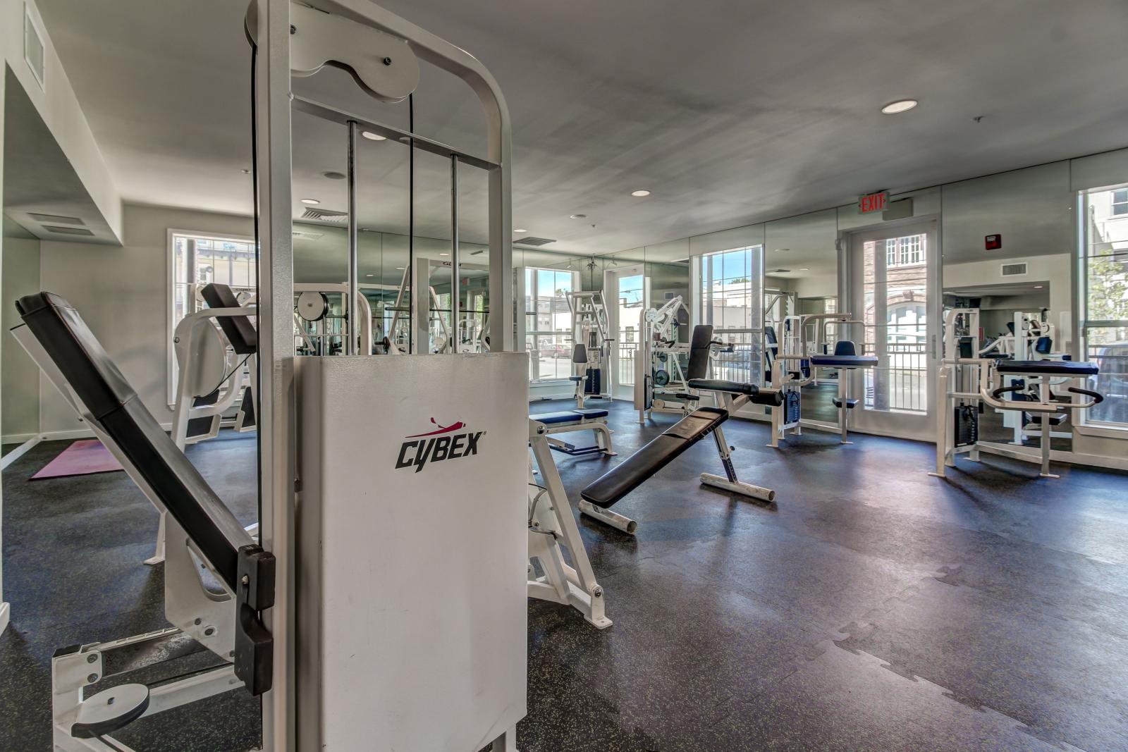 State-of-the-art Cybex strength machines in The Saulet’s luxury apartment fitness center.