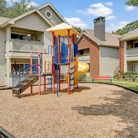 Pool area illuminated by warm sunset hues, highlighting the tranquil water and comfortable seating.