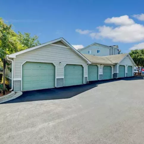 A row of private garages provides residents with secure and convenient parking solutions.