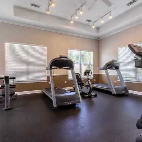 Large fitness center with multiple machines available.