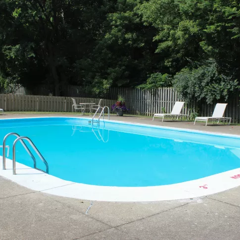 North River Place pool with lounge seating surrounding.