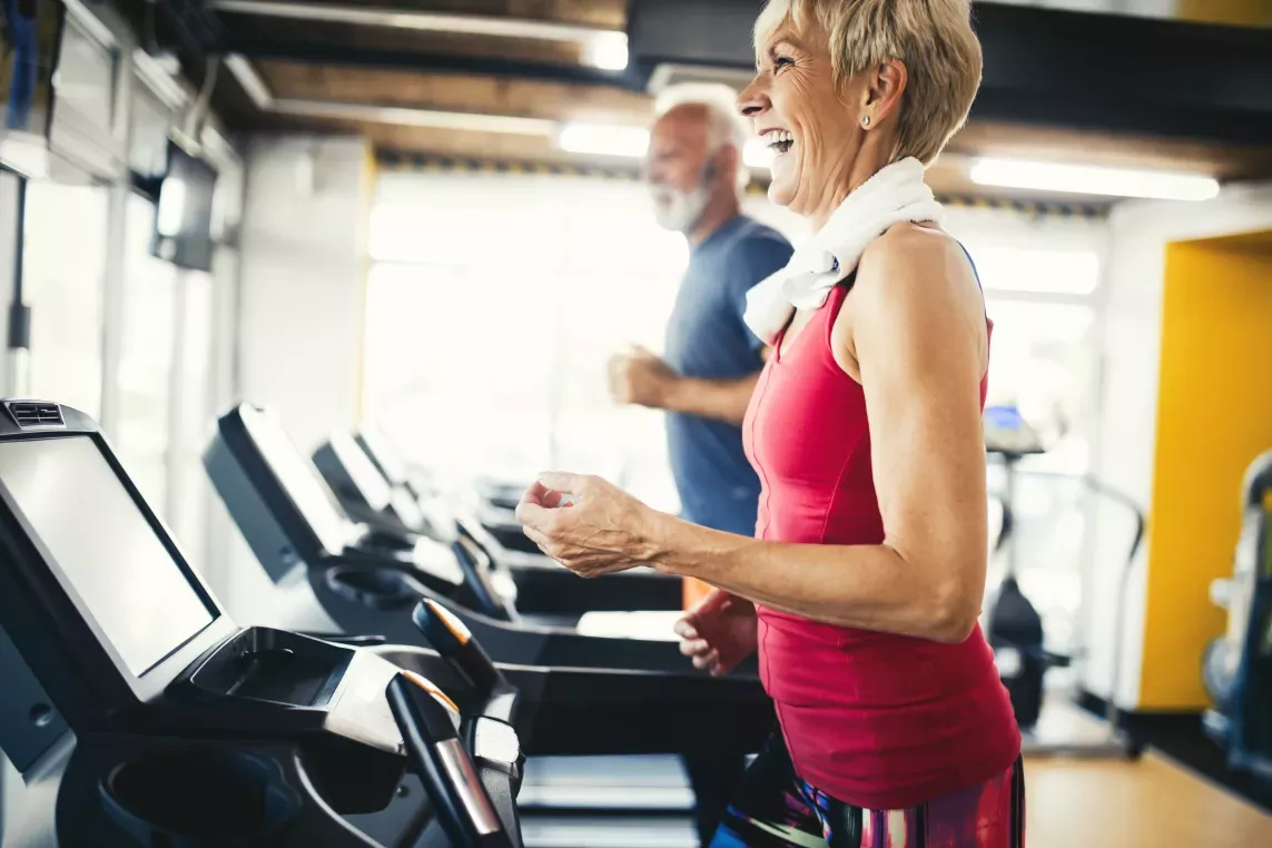 Older woman running on treadmill