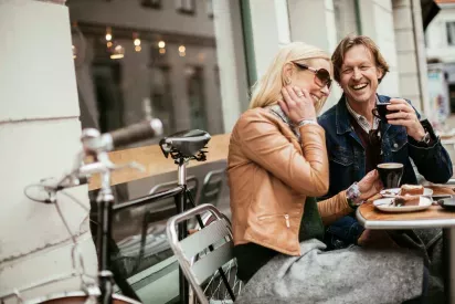 Couple drinking at an outdoor cafe