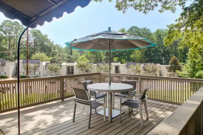 Relaxing outdoor area with inviting seating for residents to enjoy.