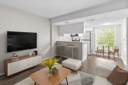 Bright, open kitchen and living room for residents to enjoy.