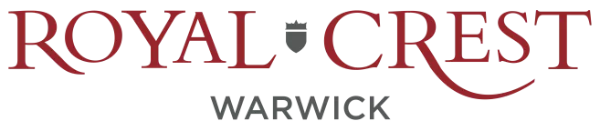Royal Crest Warwick logo, red wordmark with crest icon.