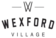 Black Wexford Village apartment community logo with stylized “W” and bold lettering.